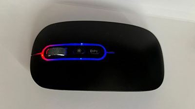 a black wireless mouse from the top